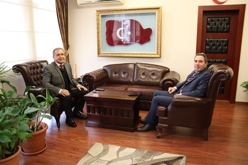 Bergama Kaymakamı Avni ORAL' ın Kaymakamımız Özkan DEMİR’ e Makamında Ziyareti